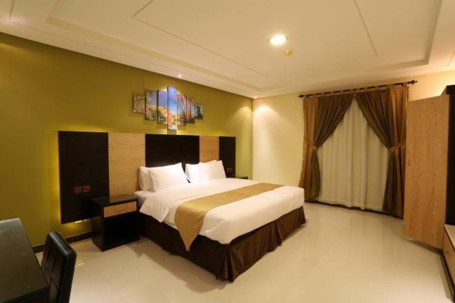 Aparthotel Tulip Al Rawdah Riad Habitación foto